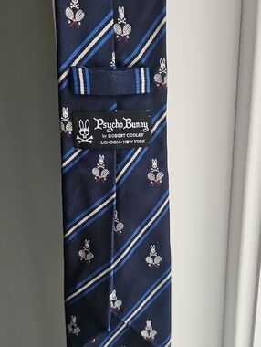 Psycho Bunny Navy Tie with Blue and Cream Diagonal Stripes